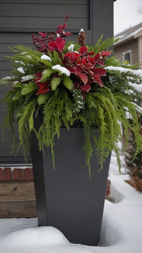 Transform your front porch for the winter months with our guide to creating stunning winter planters This blog post explores simple DIY ideas that incorporate beautiful elements like tall faux Christmas trees vibrant pansies and natural birch branches all aimed at bringing warmth and charm to your outdoor space Discover how to utilize late lanterns for added sparkle and create an inviting atmosphere that welcomes guests during the cold season Whether you live in the UK or enj Entry Pots Front Entrances, Winter Flower Pots Outdoor Front Doors, Winter Front Porch Planter Ideas, Winter Planter Ideas Flower Pots Outdoor Christmas, Winter Porch Plants, Entryway Planters Front Entry, Outdoor Winter Planters, Winter Hanging Baskets Outdoor, Diy Christmas Planters Front Porches