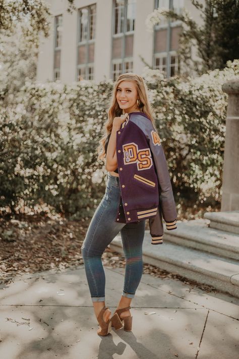 Letterman Jacket Couple Pictures, Senior Picture Varsity Jacket, Senior Picture Ideas Varsity Jacket, Senior Picture Poses Letterman Jackets, Letterman Jacket Graduation Pictures, Senior Picture With Letterman Jacket, Letterman Photoshoot, Letterman Jacket Outfit Senior Pictures, Senior Pics Letterman Jacket