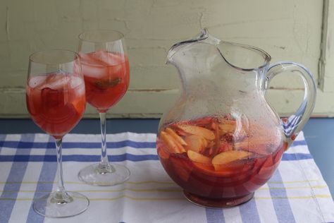 This sangria is really different and outrageously good. Emeril Recipes, Rose Sangria, Sparkling Rose, Peach Slices, Strawberry Puree, Summer Grilling, Seasonal Ingredients, Fun Cocktails, Sangria