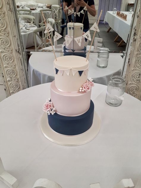 Navy and blush bunting wedding cake Navy And Pink Wedding Cake, Navy Blue And Pink Cake, Navy And Blush Wedding Cake, Dirty 30 Cake, Royal Blue Cake, Blush Cake, Wedding Cake Pink, Navy Blue Wedding Cakes, Pink Baby Shower Cake