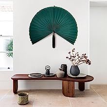 it is a symbol of wealth, luck and protection. Beautiful fan tail motifs and decorative fans are traditional wall pedestals in Asian homes. earth-friendly making it a wonderfully sustainable, eco-friendly, and popular decorative material.🧘 Folding Walls, Wall Fan, Fan Decoration, Sustainable Decor, Asian Homes, Bamboo Wall, Japandi Style, Decor Details, Asian Decor