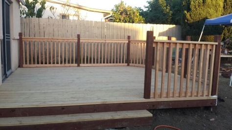 Ground level deck with railing Low Deck Ideas Ground Level Railings, Deck With Partial Railing, Ground Level Deck With Railing, Deck With Railing, Stoop Ideas, Ground Level Deck, Backyard Spa, Cement Patio, Den Ideas