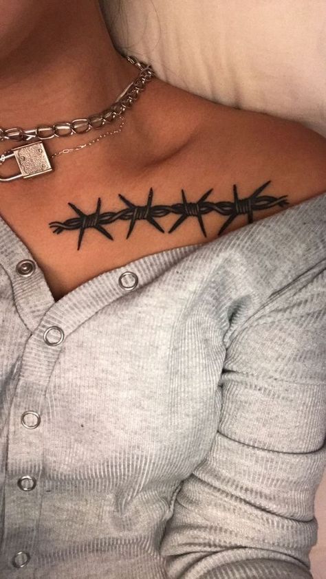 Learn the surprising barbed wire tattoo meaning before you get it on a body. As a bonus, we've added more than 60 unusual ideas for inspiration. Barbed Wire Collar Bone Tattoo, Tattoo Chest And Shoulder, Self Made Tattoo, Barbed Wire Tattoo, Wire Tattoo, Clavicle Tattoo, Barbed Wire Tattoos, Stomach Tattoos Women, Bone Tattoo