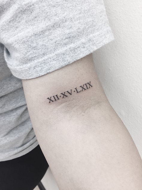 Roman numerals on bicep tattoo Bicep Tattoo Roman Numerals, Roman Numerals Font Tattoo, Roman Numeral Font Style Tattoo Ideas, Tattoo Fonts Roman Numerals, Roman Numerals Tattoo Forearm, Roman Numerals On Forearm, Roman Numbers Tattoo Arm, Roman Numeral Bicep Tattoo, Roman Numeral Tattoo On Forearm