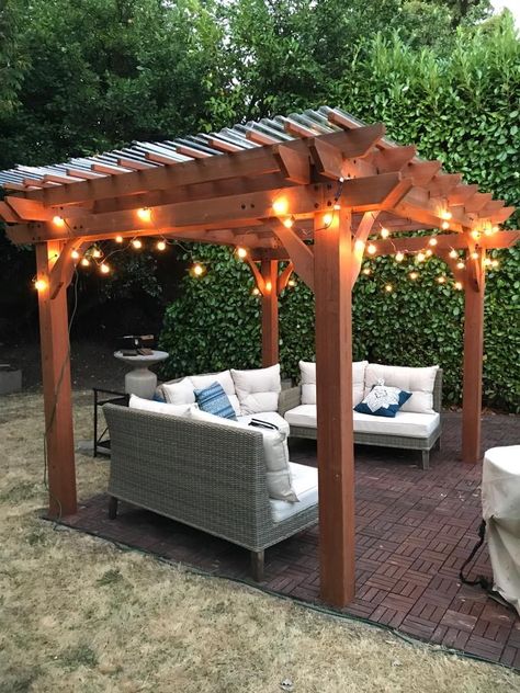 Backyard patio makeovers aren't complete without twinkly lights! Here are 10 more ideas to build the backyard patio of your dreams #backyard #diy #home Patio Makeover Ideas, Backyard Patio Makeover, Diy Hanging Planter, Diy Storage Bench, Hot Tub Backyard, Pergola Ideas, Small Dining Area, Twinkly Lights, Small Backyard Gardens