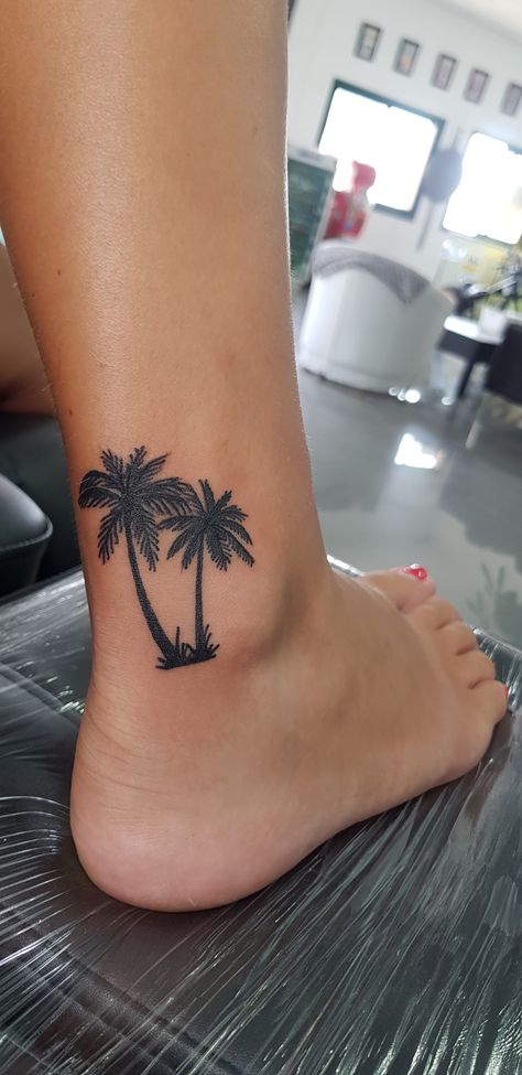 Hawaiian Hand Tattoos For Women, Out Of Many One People Jamaica Tattoo, Palm Tree Compass Tattoo, Jamaica Inspired Tattoos, Small Hawaii Tattoos, Beach Tatoos Woman, Palmetto Tree Tattoo, Small Beach Tattoo For Women, Inside Ankle Tattoo