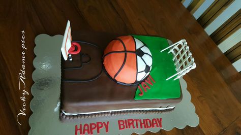 Basketball/soccer cake Soccer Basketball Cake, Basketball Football Cake, Basketball And Soccer Cake, Basketball Theme Cake Design, Cake With Basketball Design, Soccer And Basketball, Basketball Birthday Cake, Soccer Cake, Basketball Cake