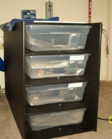 Another great housing option: racks!  Tubs fixed in a shelving unit with proper heating and heat regulation attached.  Most ball python breeders use these. Diy Snake Rack With Heat, Snake Tub Setup, Ball Python Enrichment, Ball Python Tub Setup, Snake Tank Setup Ball Python, Ball Python Cage, Aesthetic Ball Python Tank, Reptile Rack, Bio Active Terrarium Ball Python