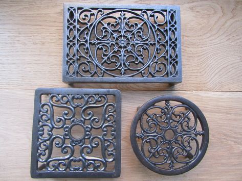 Decorative cast iron trivet Available in 4 designs Material: Cast iron Finish: The finish is Antique cast iron making it suitable for the wood burner or hob, or the kitchen or table This product has been designed to age naturally and develop its own patina over time. For authenticity, this product is supplied unfinished has, instead, been expertly hand waxed. This wax serves as a basic protective layer against moisture however, if exposed to the outdoor elements for prolonged periods of time, th Hob Kitchen, Kitchen Hob, Age Naturally, Antique Kitchen Decor, Cast Iron Decor, Iron Kitchen, Iron Brackets, Kitchen Pot, Hot Plate