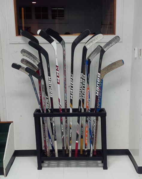 Hockey Sticks Hockey Stick Storage, Hockey Equipment Storage, Organization Storage Ideas, Hampers Baby, Shoes Organization, Sports Equipment Organization, Shoe Organization Diy, Sports Equipment Storage, Stick Storage