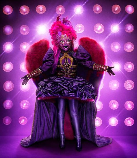 The Masked Singer Season 3 Alannah Myles, Night Angel, Deep Purple Dress, Singer Costumes, Joel Mchale, Ken Jeong, Purple Gloves, Jesse Mccartney, Kandi Burruss