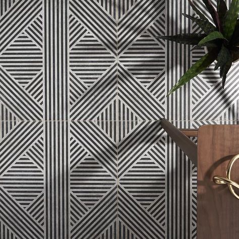 The tile touts a bold, bluish gray and white pattern on its porcelain body. This matte tile showcases an eccentric design that makes any space more exciting. A break from tradition, the stripes on Bowery are overlapping, and go in opposing directions to form a multi-dimensional look. Place wherever you desire as it can be used on both walls and floors. Patterned Wall, Matte Tile, Ivy Hill Tile, Porcelain Mosaic Tile, Décor Boho, Bathroom Floor Tiles, Commercial Flooring, Tile Work, Beautiful Tile