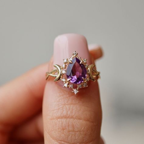 Purple And Gold Wedding Rings, Engagement Rings Celestial, Gold Amethyst Engagement Ring, Unique Purple Engagement Rings, Purple And Gold Engagement Ring, Rings Engagement Purple, Engagement Rings Purple Stone, Rapunzel Ring Engagement, Crescent Moon Engagement Ring