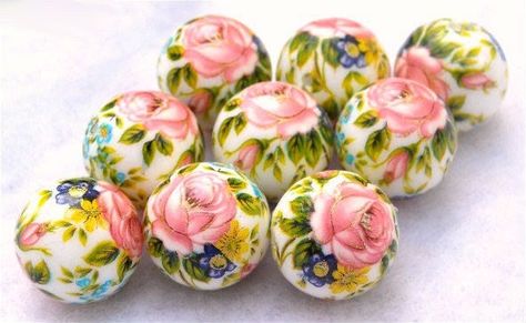 Beautiful Wholesale Japanese Tensha Beads Pink Roses on White 12mm round, 9 pieces. Tensha are amazing handmade beads from Japan, and make stunning pieces of jewelry. Tensha beads are acrylic and highly decorated in beautiful details.  These beads display PINK roses with multi-green leaves on a white background.   'Tensha' translates to mean 'transfer.' That is the method by which these beads are made.  Enjoy designing with these Japanese beauties! FREE USA SHIPPING FOR TOTALS EXCEEDING $35.00 T Tensha Beads, Resin Beads, Handmade Beads, Green Leaves, Pink Rose, Pink Roses, White Background, Jewelry Design, Roses