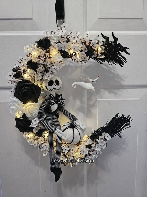 Skeleton moon wreath, Black and white home decor, Crescent moon wreath, Bat wreath, Skull wreath, Gift, Gothic wreath, 14" This lovely skeleton moon wreath is perfect for your gothic home decor. It's black and white colors are a beautiful touch to your dark interior style. Give as a gift for a Halloween wedding, birthday, or anniversary to anyone who loves moons, skulls, and all things gothic.  Made with a grapevine base painted black. Plush character. Plush/foam pumpkin. Glitter foam bats (no s Bike Wheel Wreath, Moon Wreaths, Gothic Wreath, Bat Wreath, Crescent Moon Wreath, Nightmare Before Christmas Wreath, Moon Wreath, Halloween Maze, Black And White Home Decor