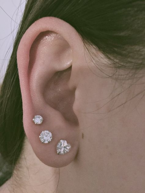 Triple lobe studs with a heart ❤️ Triple Lobe Piercing Studs, Triple Lobe, Triple Lobe Piercing, Ear Peircings, Pretty Ear Piercings, Cool Ear Piercings, Cute Piercings, Lobe Piercing, Ear Piercing