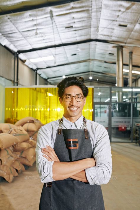 Coffee business owner by DragonImages. Portrait of smiling confident Asian coffee roastery owner standing warehosue with sacks of coffee behend and looking ... #Sponsored #Portrait, #smiling, #confident, #DragonImages Coffee Roastery, Coffee Business, Buy Coffee, Business Owner, Coffee