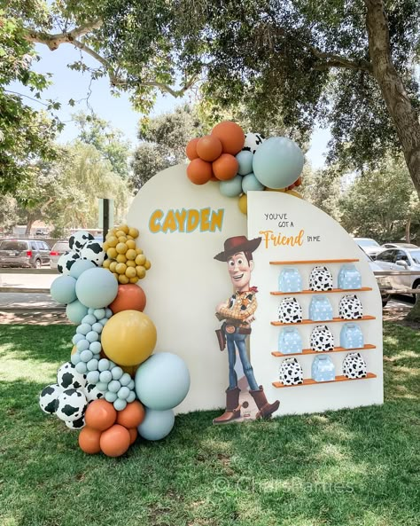 Just loving the muted colors and creativity of Cayden’s Toy Story first birthday celebration! Such a cute aesthetic and fun table… | Instagram Mickey Cowboy Birthday, Toy Story First Birthday, Woody Birthday, Toy Story Cookies, Toy Story Bday, Toy Story Party Decorations, Toy Story Baby, Thomas Birthday, Boys 1st Birthday Party Ideas