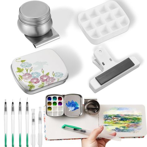 PRICES MAY VARY. Travel Friendly Design: our sketch watercolor kit is a nice match for artists on the go; It features 1 mini paint palette, 6 watercolor brushes, 1 tiny tin box, 1 clip, 1 oil pot, and 1 mini watercolor sketchbook, all comfortably packed in a compact form; Just pack it up and let your creativity flow, wherever you travel; This makes it an ideal and versatile portable watercolor kit for artists Quick Setup and Clean up: enjoy swift, hassle free painting sessions with our travel pa Mini Sketchbook, Mini Watercolor, Travel Art Kit, Sketchbook Artist, Free Painting, Sketch Watercolor, Leather Journal Notebook, Watercolor Kit, Watercolor Sketchbook