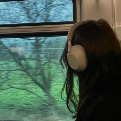 A Train, A Girl, Headphones, Trees, Train, The World