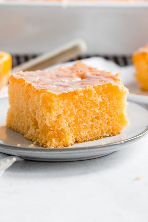 Jello Cake is a favorite at Oh Sweet Basil and this Orange Jello Cake is no different! It is easy to make and everyone will love the zesty orange flavor! #orangejellocake #dessert #jellocake Orange Jello Cake, Lemon Jello Cake, Jello Cake Recipes, Cake Recipes For Beginners, Orange Jello, Oh Sweet Basil, Jello Cake, Orange Cake Recipe, White Cake Recipe