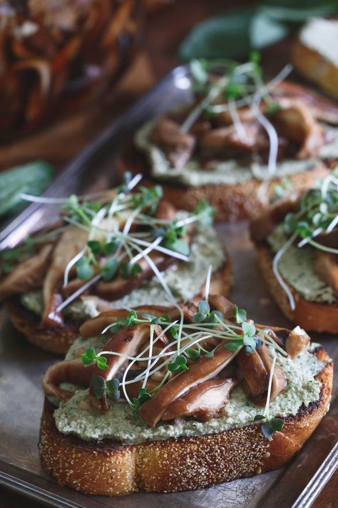 These shiitake crostini have been pickled in balsamic rice vinegar and paired with a creamy basil pesto ricotta spread for the perfect toasty bite. With @nakanosplash #sponsored Adaptogenic Recipes, Ricotta Spread, Mushroom Bruschetta, Pesto Ricotta, Savory Appetizers, Grill Sandwich, New Year's Eve Appetizers, Crostini Recipes, Mini Bites