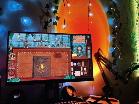 Dimly lit PC gaming setup, game playing: strange horticulture Strange Horticulture Game, Strange Horticulture, Cozy Gaming Setup, Gamer Stuff, Cozy Gaming, Gaming Setup, Horticulture, Game Art, Gaming