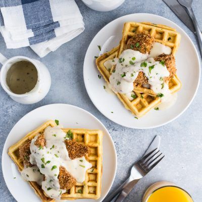 These savory Jalapeno Cornbread waffles are topped with crispy oven baked chicken tenders and white gravy for the ultimate brunch dish! Savory Chicken And Waffles, Chili Cornbread Waffles, Cornbread Waffles With Pulled Pork, Savory Waffle Batter, Cheddar Jalapeño Cornbread Waffles, Cornbread Waffles, Oven Baked Chicken Tenders, Hangover Food, Crispy Oven Baked Chicken