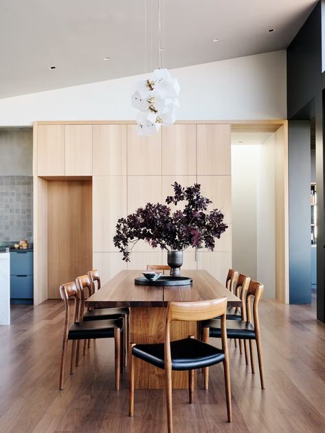 Photo 9 of 32 in Before & After: A Complete Overhaul Lifts a Jumbled Hilltop Home to Cloud Nine - Dwell Walnut Paneling, Dark Walnut Floors, Bleached Walnut, Walnut Doors, Walnut Floors, Contemporary Dining Room, Walnut Table, Cloud Nine, Minimalist Architecture