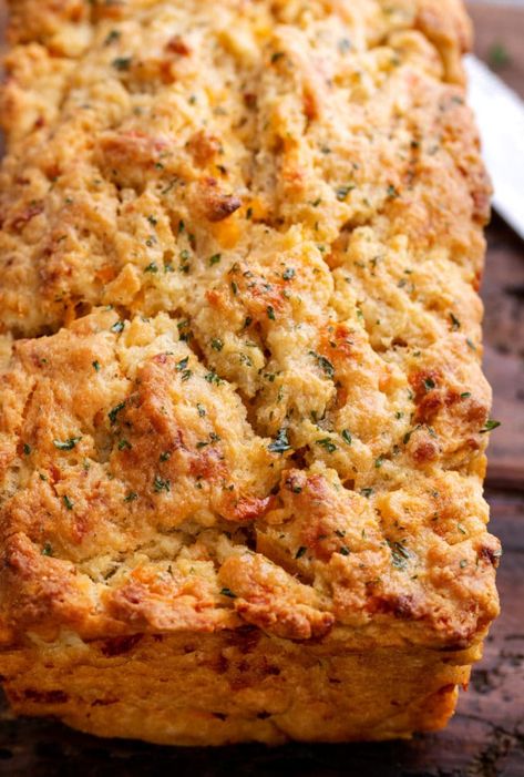 Whip up a loaf of this Garlic Cheddar Beer Bread in practically no time - and with NO yeast! No rising time, just mix and bake!  Tastes like Cheddar Bay biscuits, in loaf form! #beerbread #bread #garlic #cheddar #cheese #beer #baking #breadmaking #quickbread #pantry Beer Bread Muffins, Beer Cheese Bread Recipe, Cheddar Beer Bread, Beer Cheese Bread, Batter Bread, Honey Beer Bread, Fish Batter Recipe, The Chunky Chef, Garlic Cheddar