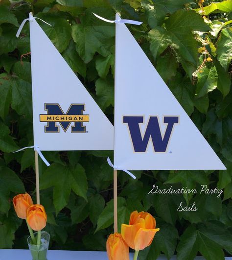 Nautical Graduation Party Centerpieces -Fun idea to have College Logos on sails Sailing Centerpieces, Nautical Theme Graduation Party, Nautical Graduation Party, Picnic Centerpieces, Middle School Graduation Party, Nautical Centerpiece, Photo Centerpieces, Graduation Centerpieces, Diy Nautical Decor