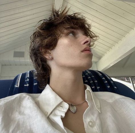 jace cameron, instagram, white boy, fluffy dirty brown hair, freckles, side profile, upward profile, pink lips, makeup for men, silver vintage thrifted silver necklace, white linen cotton button down long sleeve shirt, jawline, diamond earrings, aesthetic picture, male model Jace Cameron, Fluffy Curly Hair, Garfield Spiderman, Look Back In Anger, Gym Boy, Putao, Aesthetic Women, Aesthetic Guys, Silver Heart Necklace