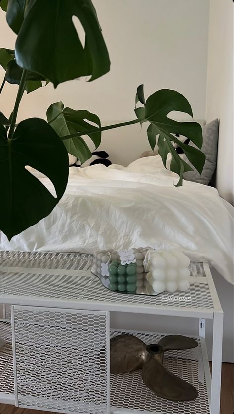 White room and white bed with candles plants and decoration White Room With Plants, 2024 Bedroom, Basement Room, Candle Plant, White Bed, Bedroom Plants, London Apartment, Plant Aesthetic, Minimalist Room