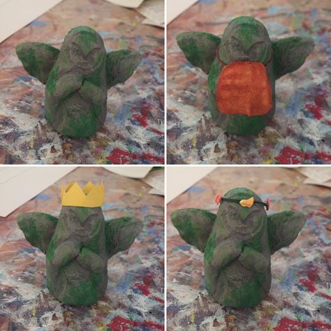 Small statue made of clay, painted green and gray. Designed to look like different versions of Hylia’s statue in villages from Breath of the Wild. Hylia Statue, Rito Village, Goron City, Kakariko Village, Statue Design, Goddess Statue, Breath Of The Wild, Statue, Design