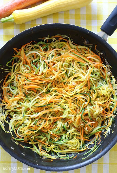 Sauteed Julienned Summer Vegetables – zucchini, yellow squash and carrots cut into spaghetti like strands and sauteed with garlic and oil. I make this side dish ALL summer long! #cleaneats #vegetarian #glutenfree #paleo #lowcarb Zucchini Yellow Squash, Garlic And Oil, Summer Vegetables, Sauteed Zucchini, Veggie Noodles, Spiralizer Recipes, Yellow Squash, Summer Vegetable, Zucchini Noodles