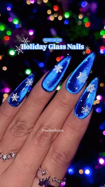 Blue And Black Christmas Nails, Cat Eyes Christmas Nails, Blue Cat Eye Christmas Nails, Holiday Glass Nails, Christmas Magnetic Nails, Cats Eye Christmas Nails, Cateye Christmas Nail, Blue Jelly Nails Acrylic, Christmas Cat Eye Nails Design