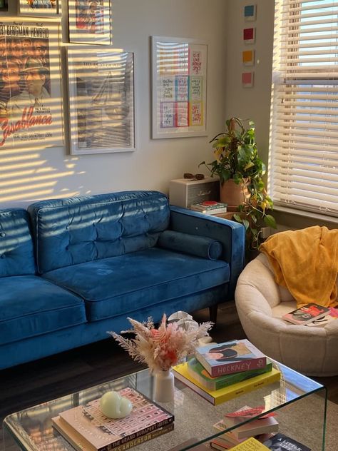 This Small Texas Rental Never Feels Dreary Thanks to Color and Disco Balls | Apartment Therapy Navy Blue Couch Aesthetic, Peacock Couch, Ottawa Apartment, Wall Decor Bedroom Ideas, Aesthetics Bedroom, 1940s House, Bedroom Wallpaper Ideas, Blue Couch Living Room, Colors Bedroom