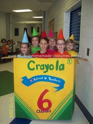 Crayola Crayons and their Box Costume: We made the girls these homemade crayola crayons and their box costume with felt, black paint metal clothes hangers, and party hats.  The box we painted Crayon Box Costume, Crayon Costumes, Crayola Birthday Party, Crayon Birthday Parties, Crayola Box, Crayon Costume, Costume Box, Maker Fun Factory, Box Costumes