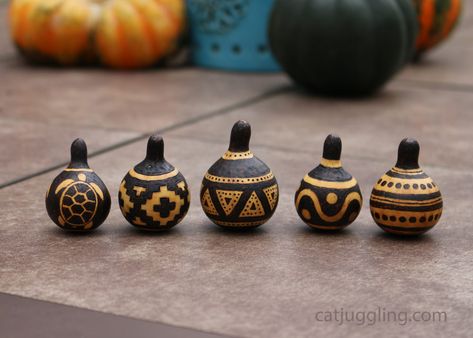 Pyrography on spinner gourds Craft Pumpkins, Pyrography Designs, Pyrography Patterns, Gourds Birdhouse, Decorative Gourds, Hand Painted Gourds, Pottery Painting Designs, Gourds Crafts, Painted Gourds