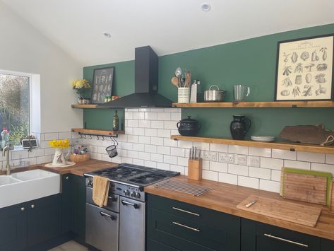 Green And Pine Kitchen, Forest Green Kitchen Wood Counter, Green Feature Wall Kitchen, Dark Green Kitchen Walls Oak Cabinets, Forest Green Kitchen Walls, Forest Green Kitchen Cabinets, Dark Green Kitchen Walls, Forest Green Kitchen, Black And Grey Kitchen