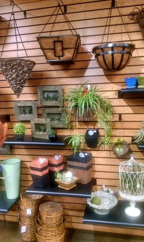 Slat Wall Storage, Retail Wall Displays, Gift Shop Interiors, Painted Wood Texture, Garden Center Displays, Slat Wall Display, Wood Slat Wall, Store Layout, Retail Shelving