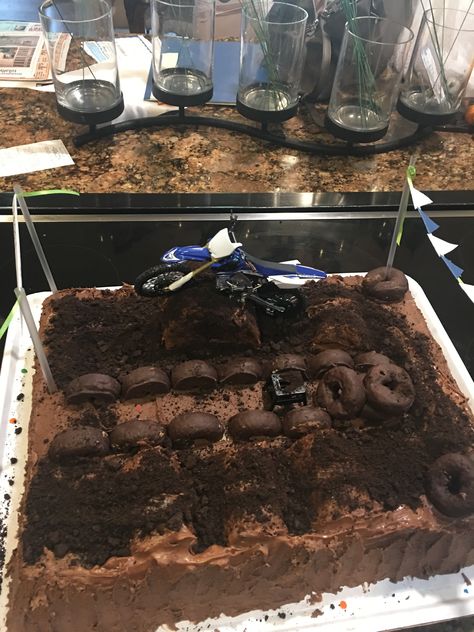 Dirt bike cake Dirt Bike Sheet Cake, Diy Dirt Bike Cake, Dirtbike Birthday Theme, Dirt Bike Party Ideas, Four Wheeler Cake, Dirt Bike Birthday Cake, Motocross Cake, Dirt Bike Cake, Costco Sheet Cake