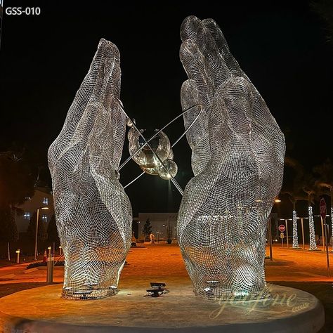 Precision crafted from stainless steel wire mesh, hand sculptures illuminate your outdoor space and can be customized to fit your unique vision. Hand Sculptures, Wire Mesh Sculpture, Mesh Sculpture, Public Sculpture, Hand Sculpture, Steel Sculpture, Metal Art Sculpture, Steel Mesh, Stainless Steel Wire