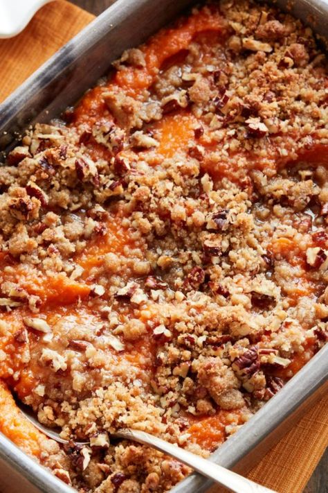 One of the best Ina Garten casserole recipes is this Sweet Potato Casserole with Pecans, made with sweet potatoes, brown sugar, milk, unsalted butter, vanilla Spinach Gratin Ina Garten, Scored Potatoes, Scalloped Cabbage, Pineapple Bake, Dinner Staples, Baked Sweet Potato Casserole, Party Potatoes, Herbed Potatoes, Sweet Potato Recipes Baked