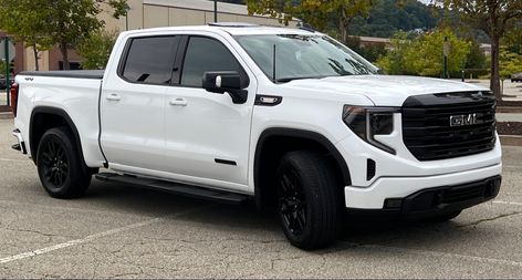 White pickup truck GMC Sierra Gmc Sierra Blacked Out, Gmc Sierra Elevation, 2023 Gmc Sierra, Swimming Outfits, Truck Mods, Gmc Sierra 1500, Sierra 1500, Gmc Sierra, Sport Team Logos