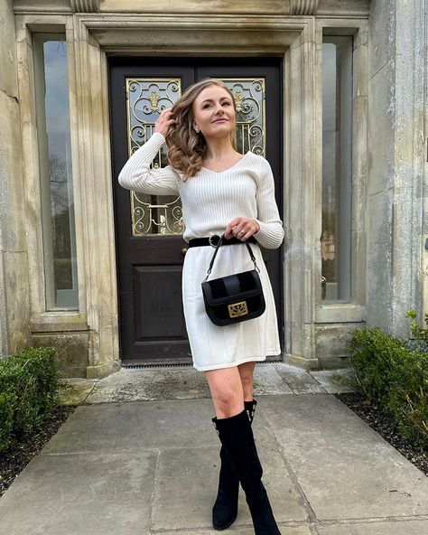 A knit dress that's perfect for spring days 🌸 @sophiasellwood looks so lovely in our white knit dress. She adds a belt to cinch the waist, knee high boots and a matching bag to finish. Code: kd170958 #IzabelLondon #Fashion #Dress #KnitDress Knit Dress With Belt, White Knit Dress By Zara, Corset Belt Sweater Dress, Knit Sweater Dress With Belt, Chic Knee-length Knitted Mini Dress, White Knit Dress, Spring Day, Knee High Boots, Knee High