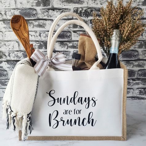 Brunch lovers, this one's for you! Our custom tote bag "Sundays are for Brunch" is TOTE-ally perfect for friends, clients, or family members who love getting their brunch on! Comes filled with all the essentials needed to enjoy the day's most important meal! Perfect for closing gifts, new homeowners, birthday gifts, hostess gifts, Secret Santa, and more! Brunch Gift Ideas, Personalized Gift Baskets, Totes Ideas, Custom Tote Bags, Closing Gifts, Gift Bundles, Sunday Brunch, New Homeowner, Secret Santa