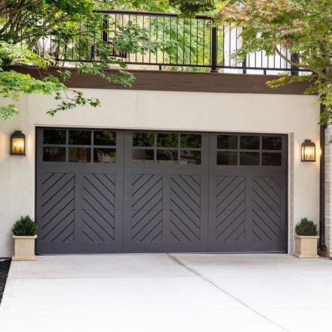 A new garage door can instantly enhance a home's curb appeal, providing a fresh, updated look. And with so many styles, materials, and price points available, homeowners have a wide range of options for finding a garage door that perfectly complements their home. From classic raised panel and carriage house doors to modern glass paneled and aluminum doors, there's a garage door to suit every style. Send us a DM to find yours! 📷: Patrick McGough | @modernfarmhouse_ohio | @carrinoanthony | @my... Hampton Style Garage Doors, Modern Farmhouse Garage Door, Garage Doors Ideas, Black Garage Door, Unique Garage Doors, Double Garage Door, Craftsman Garage Door, Carriage House Doors, Custom Garage Doors