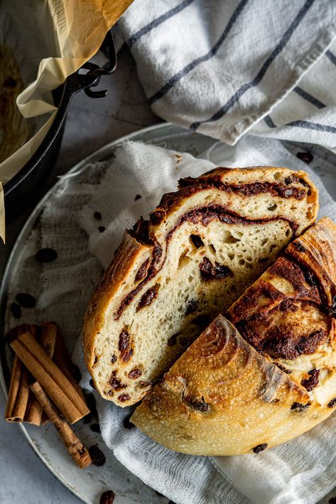 This cinnamon raisin sourdough is full of tangy sourdough, sweet raisins, and spicy cinnamon. It's the perfect mix of flavors. Use my easy to follow recipe with step by step photos and you can make this delicious bread at home! No need to go out or buy from a store when you can have fresh baked bread right from your own oven. Trust me, you're gonna love this cinnamon raisin sourdough bread recipe! | cravethegood.com Cinnamon Raisin Sourdough Bread, Cinnamon Raisin Sourdough, Best Bread Machine, Recipe Using Sourdough Starter, Sourdough Starter Discard Recipe, Cinnamon Raisin Bread, Homemade Sourdough Bread, Artisan Bread Recipes, Sourdough Starter Recipe