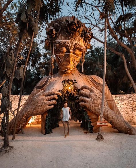 A beautiful towering wooden sculpture called "Ven a La Luz" welcomes guests onto the beach at Ahau Tulum in Mexico 🇲🇽 Photo b Best Travel Insurance, African Artists, Tulum Mexico, Destination Voyage, Cozumel, Best Places To Travel, Mexico Travel, Riviera Maya, Travel Insurance